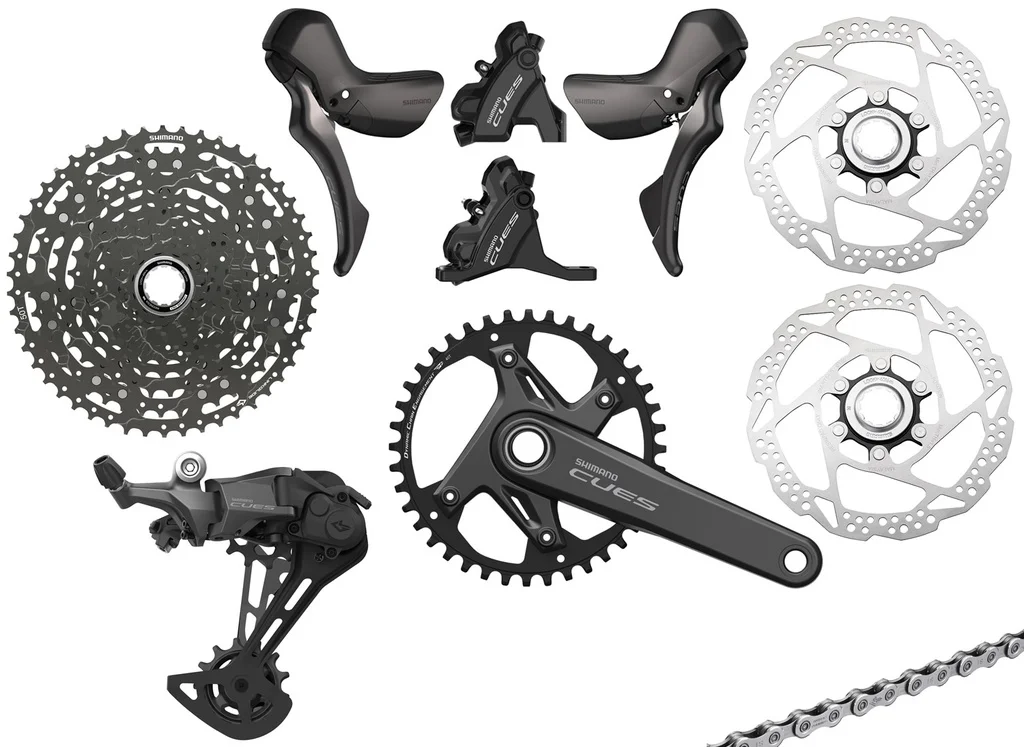 Shimano (Group)11s, Cues U6030, 2x prestavno zavorna ročka, 2x zavorna čeljust, 2x zavorni disk RT54-160, gonilka, BB-RS501, zadnji menjalnik RD-U6000 , verižnik LG400 11s, veriga LG500