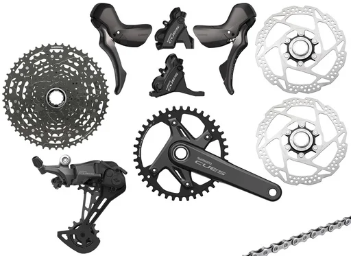 Shimano (Group)11s, Cues U6030, 2x prestavno zavorna ročka, 2x zavorna čeljust, 2x zavorni disk RT54-160, gonilka, BB-RS501, zadnji menjalnik RD-U6000 , verižnik LG400 11s, veriga LG500